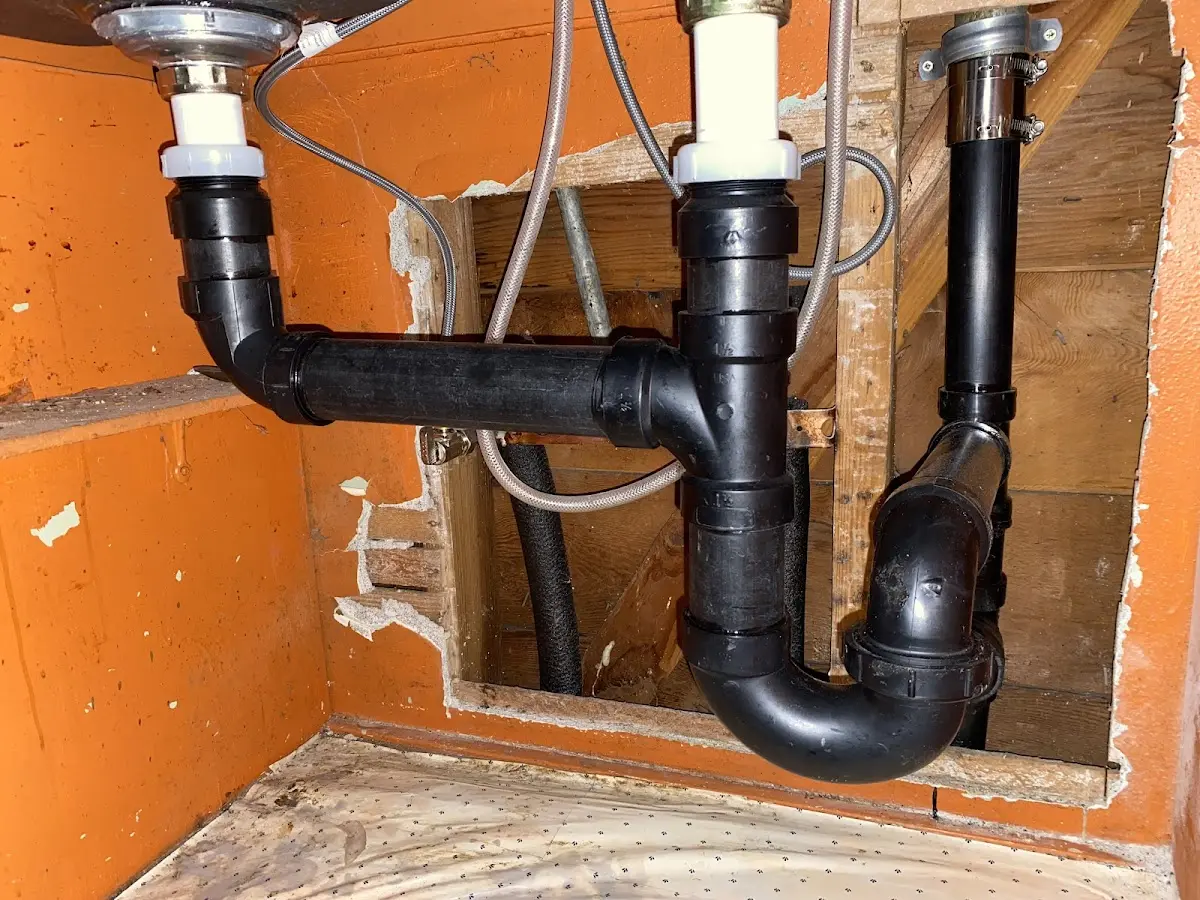 Professional Garbage Disposal Repair equipment and tools on the job in Chesterton